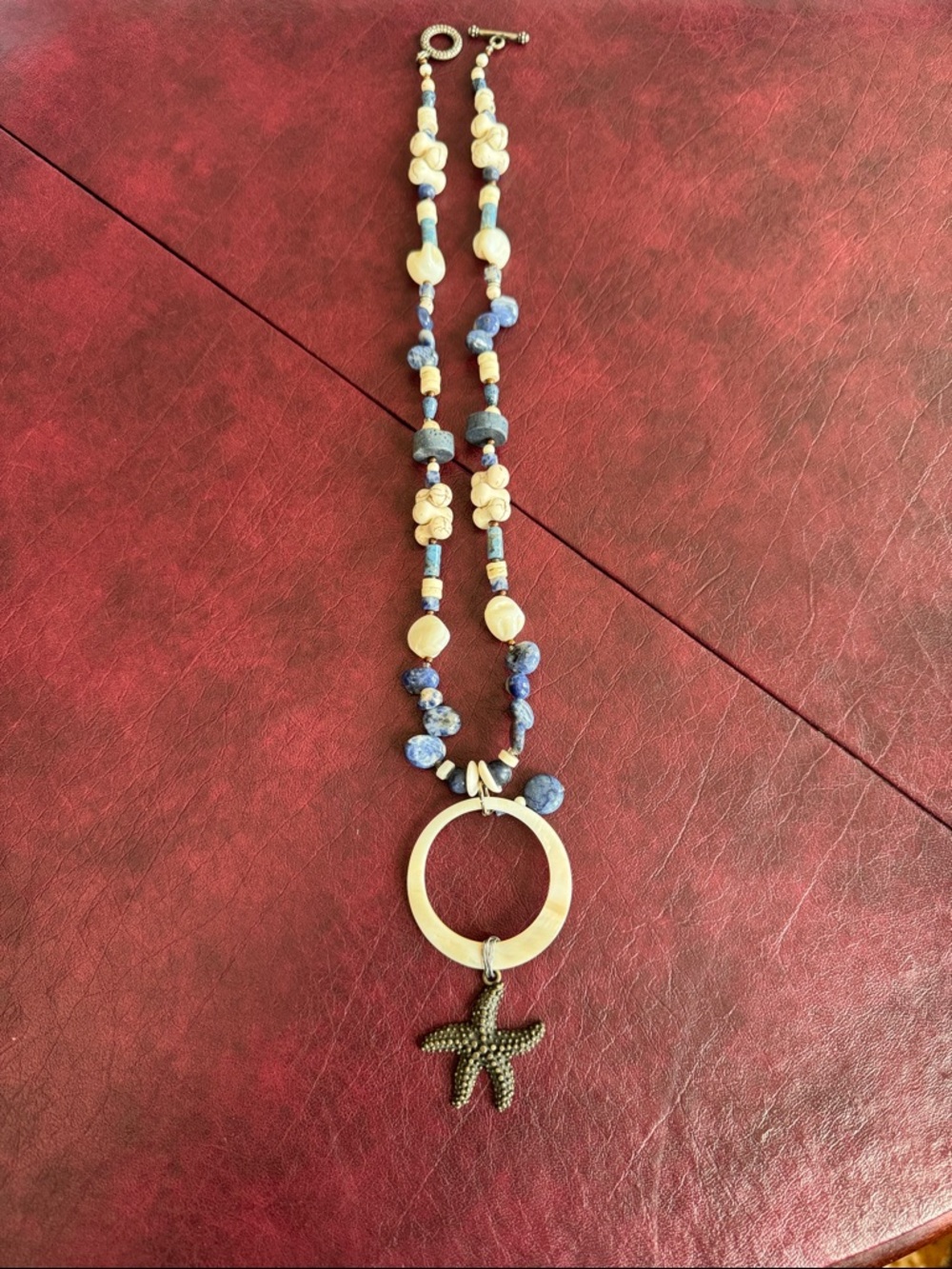 Blue and Cream Beaded and Shell Starfish Pendant Necklace.
